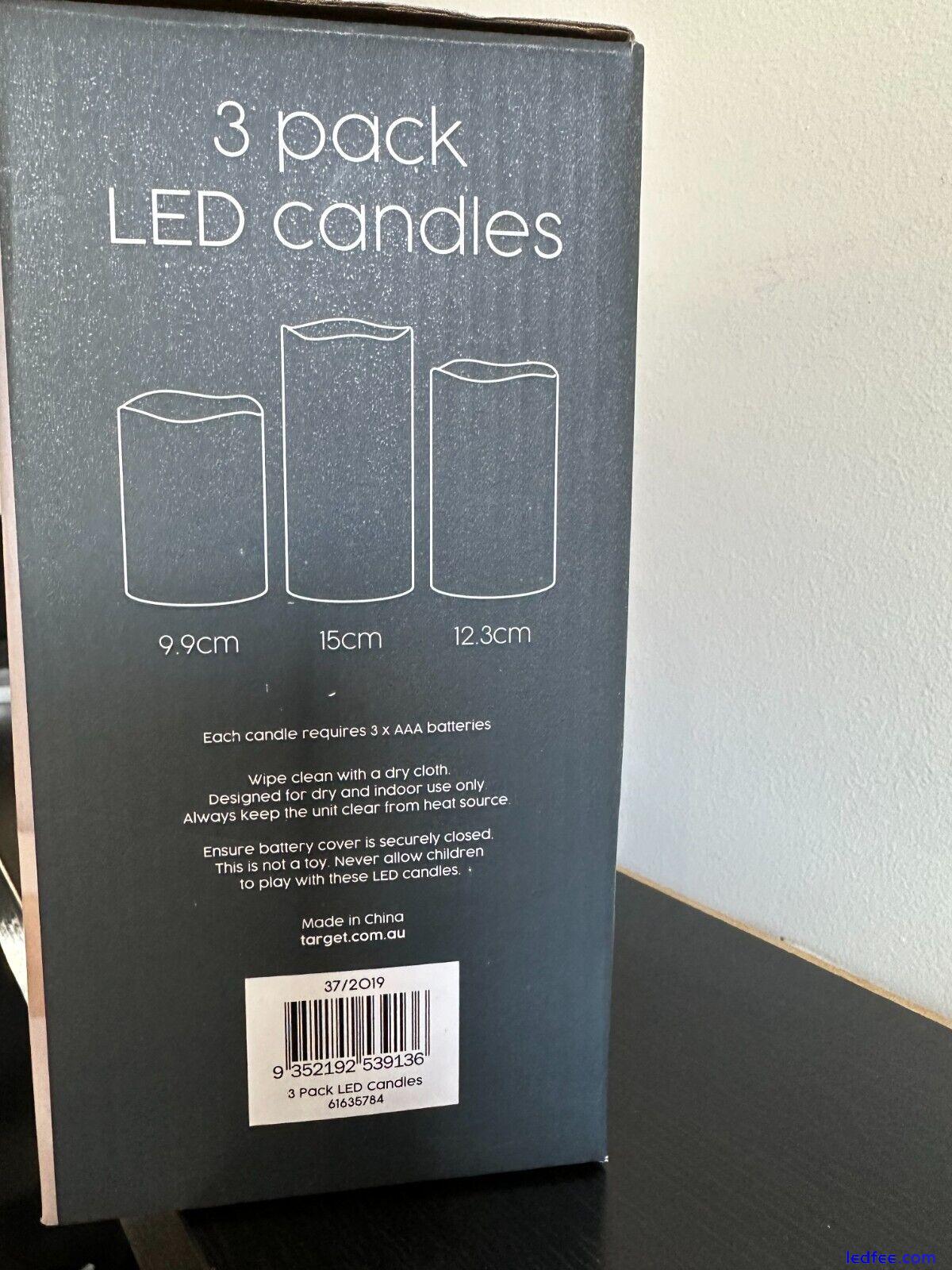 3 PACK LED CANDLES BATTERY OPERATED WAX COATED WARM WHITE LIGHT 0 