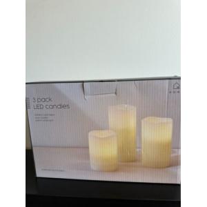 3 PACK LED CANDLES BATTERY OPERATED WAX COATED WARM WHITE LIGHT